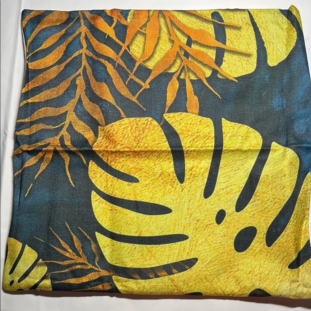 Floral Patterned outdoor waterproof throw pillow with Blue and Yellow Leaves.